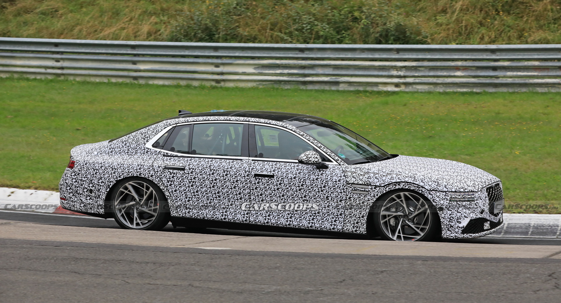 2022 Genesis G90 Caught With Less Camouflage Than Ever Before