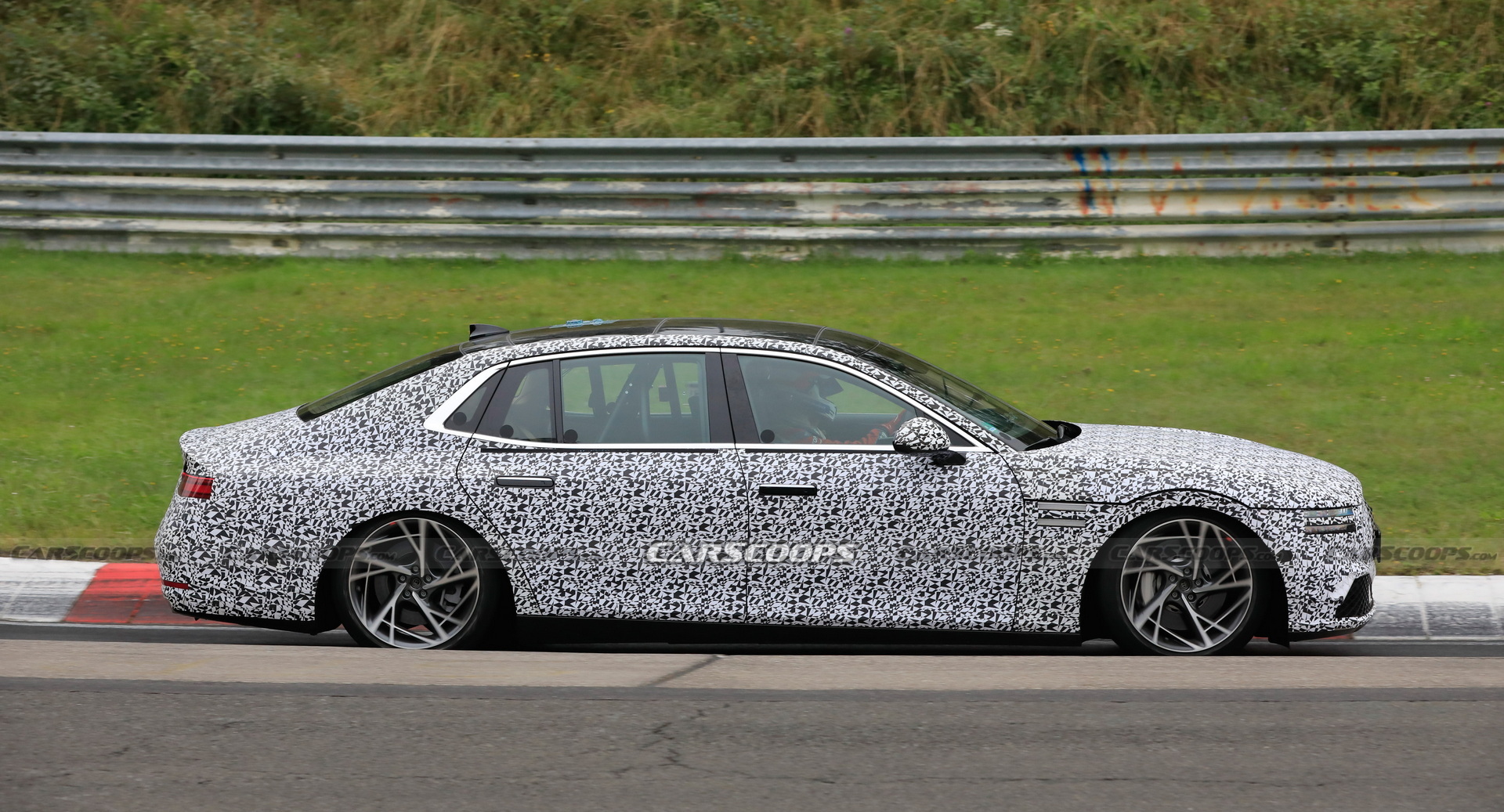 2022 Genesis G90 Caught With Less Camouflage Than Ever Before
