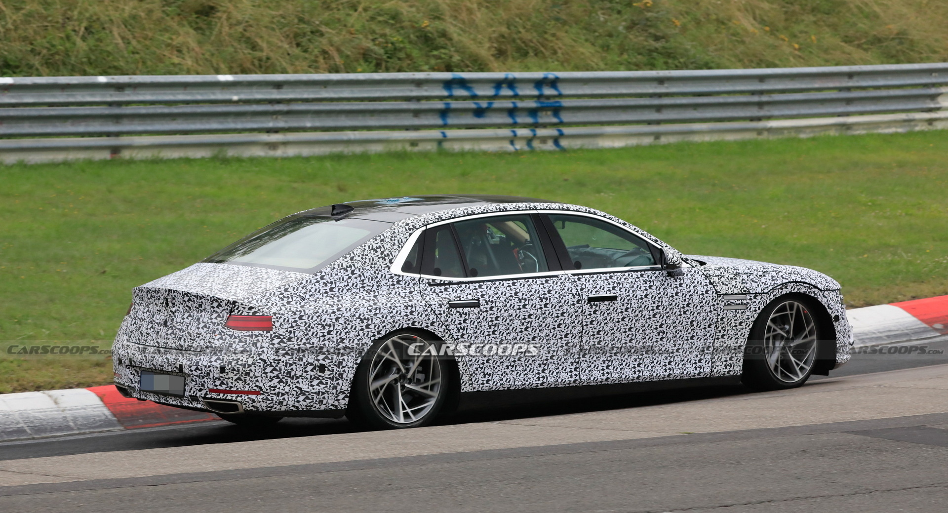 2022 Genesis G90 Caught With Less Camouflage Than Ever Before