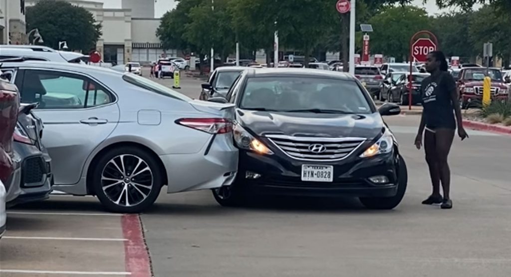 Woman Filmed Repeatedly Ramming Car In Attempt To Flee After Causing An Accident
