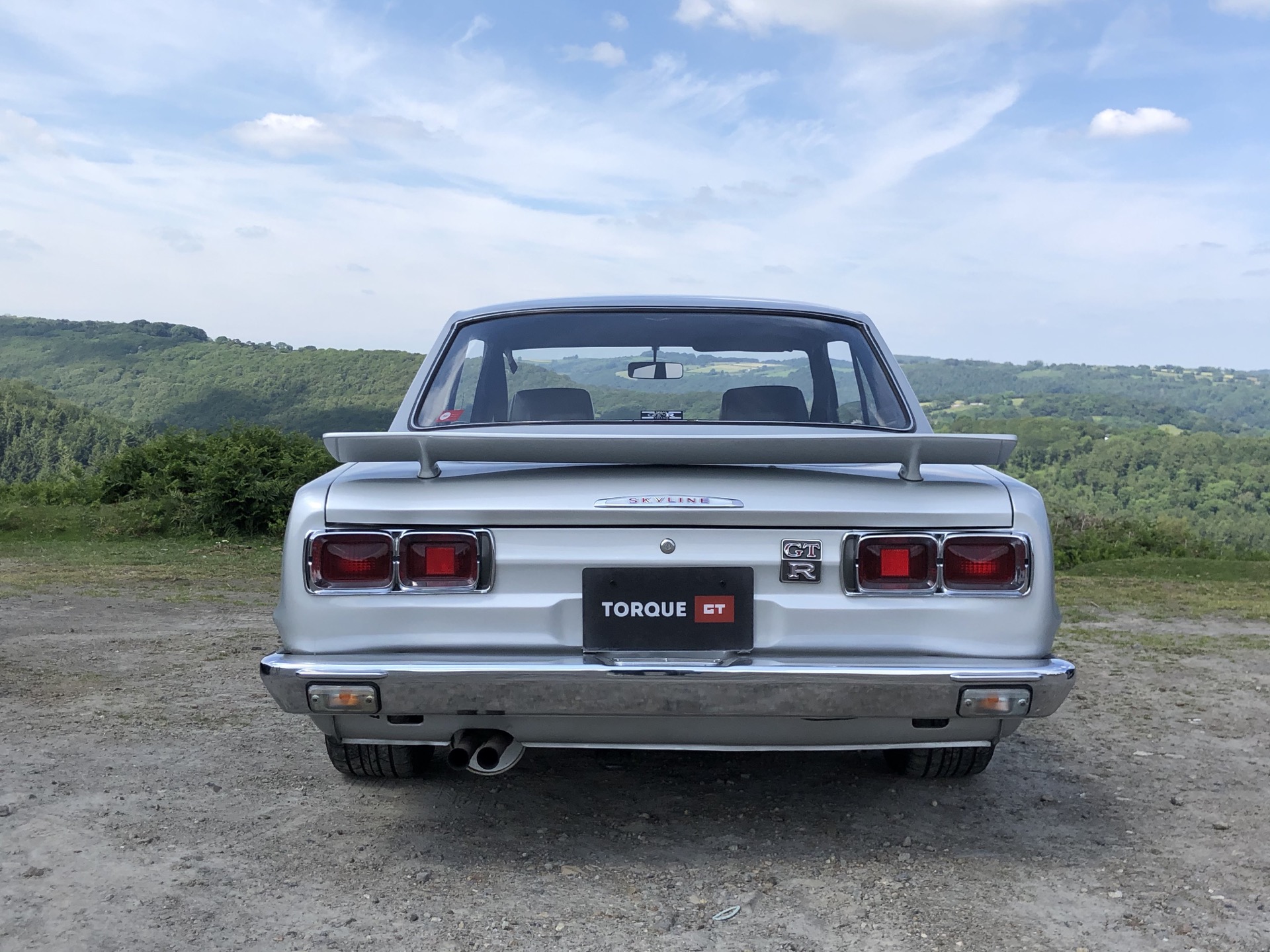 Driven: Tesla’s Model 3 Feels Like A Spaceship Next To An Original Nissan Skyline GT-R