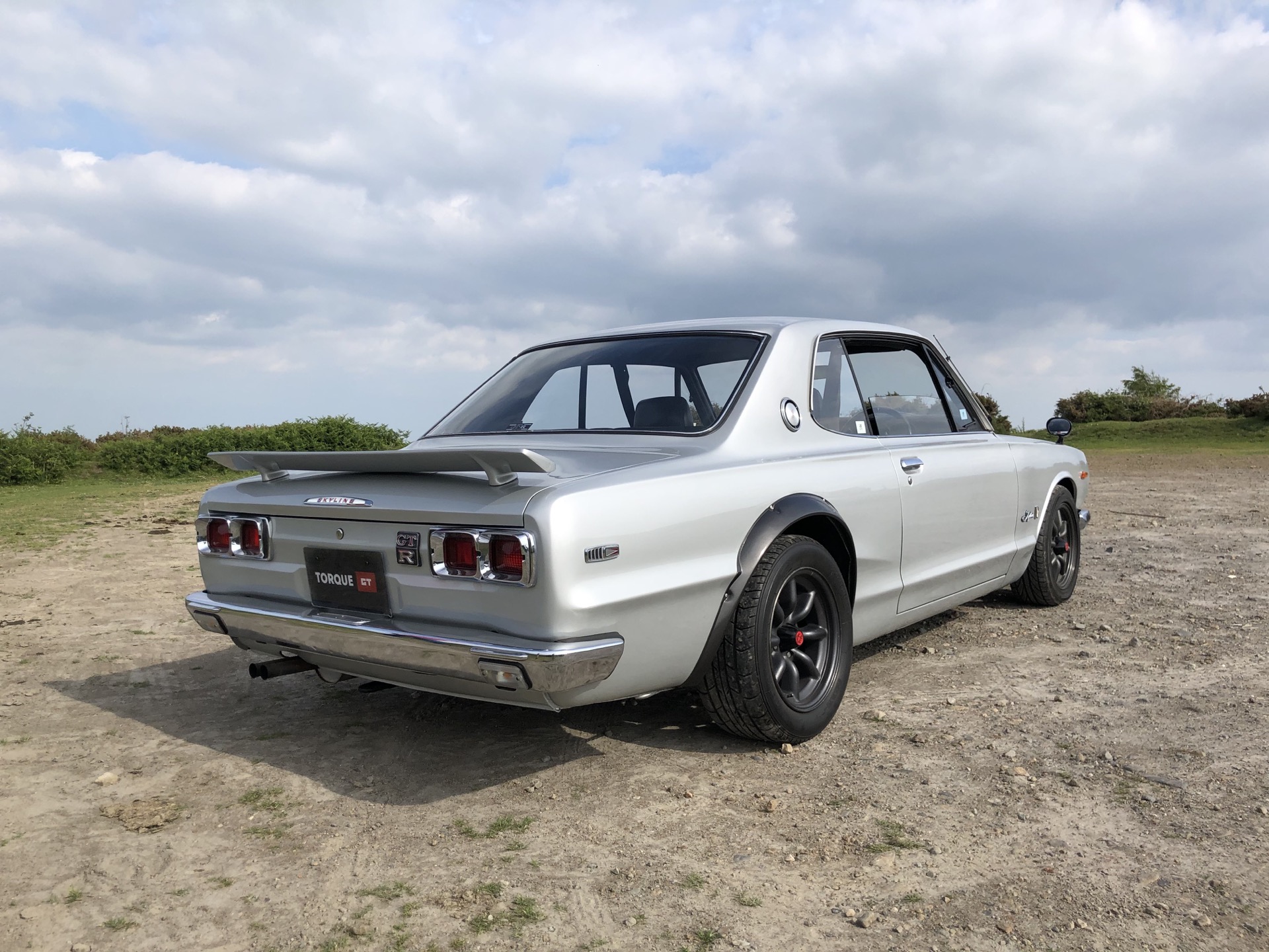 Driven: Tesla’s Model 3 Feels Like A Spaceship Next To An Original Nissan Skyline GT-R