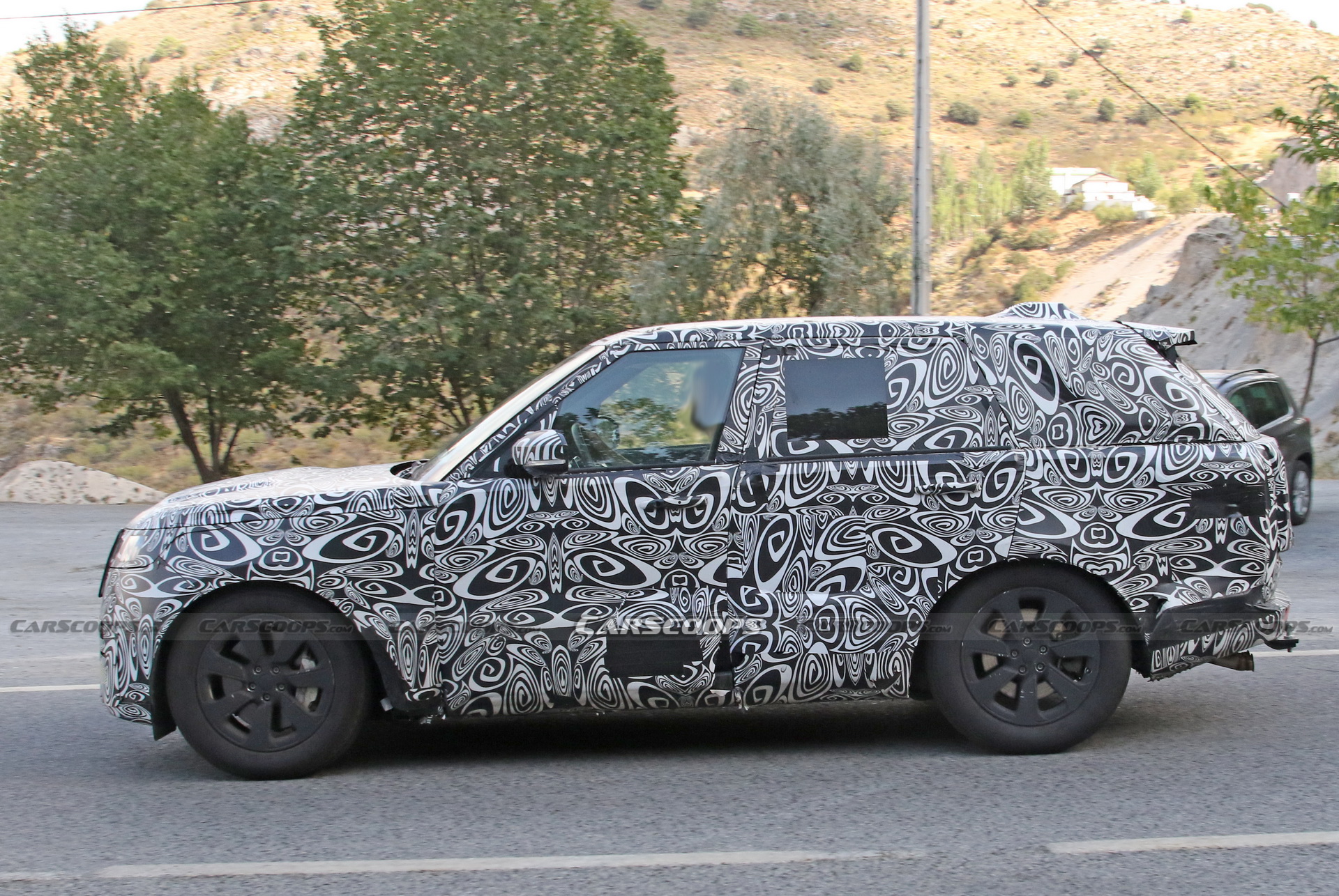 2023 Range Rover Spotted In Hot SVR Guise Under Heavy Camouflage