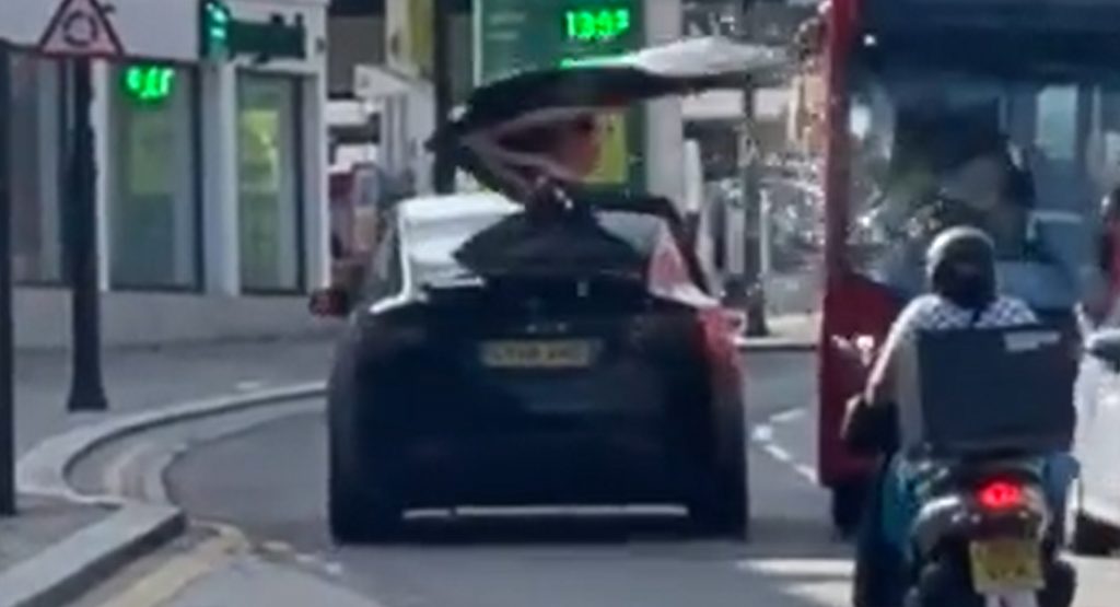  Tesla Model X Gets Falcon Wing Door Clipped By A Bus While Showing Off