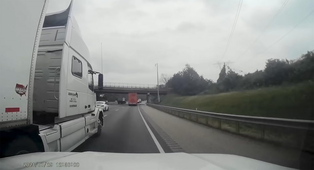 Truck Driver Tries To Run Car Off Highway, Threatens Them With A Hammer After Pulling Over