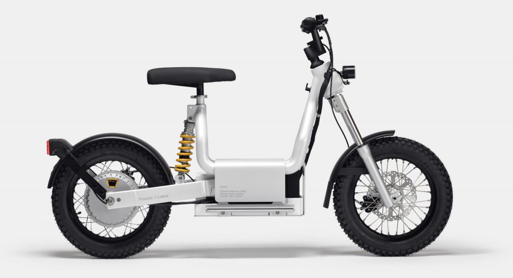  The Cake Makka Electric Moped Charges As Its Being Carried By The Polestar 2
