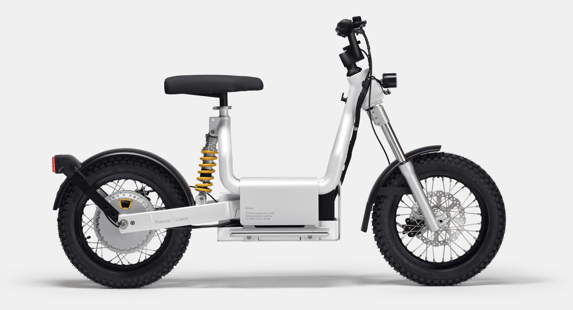 The Cake Makka Electric Moped Charges As Its Being Carried By The Polestar 2