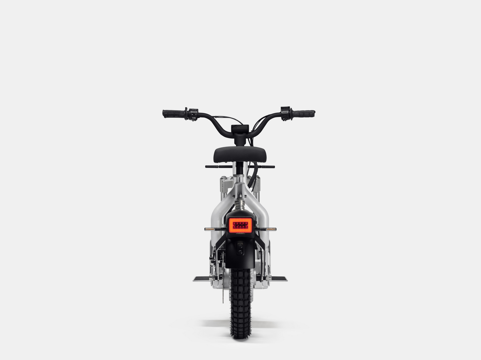 The Cake Makka Electric Moped Charges As Its Being Carried By The Polestar 2