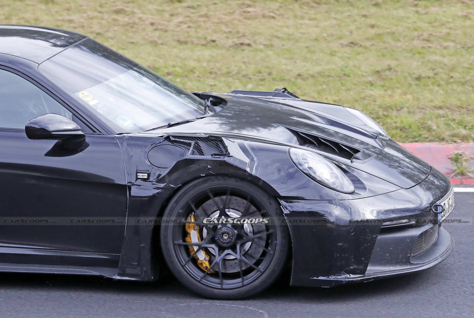 2023 Porsche 911 GT3 RS Spied Again With Racecar Looks And Conventional Door Handles