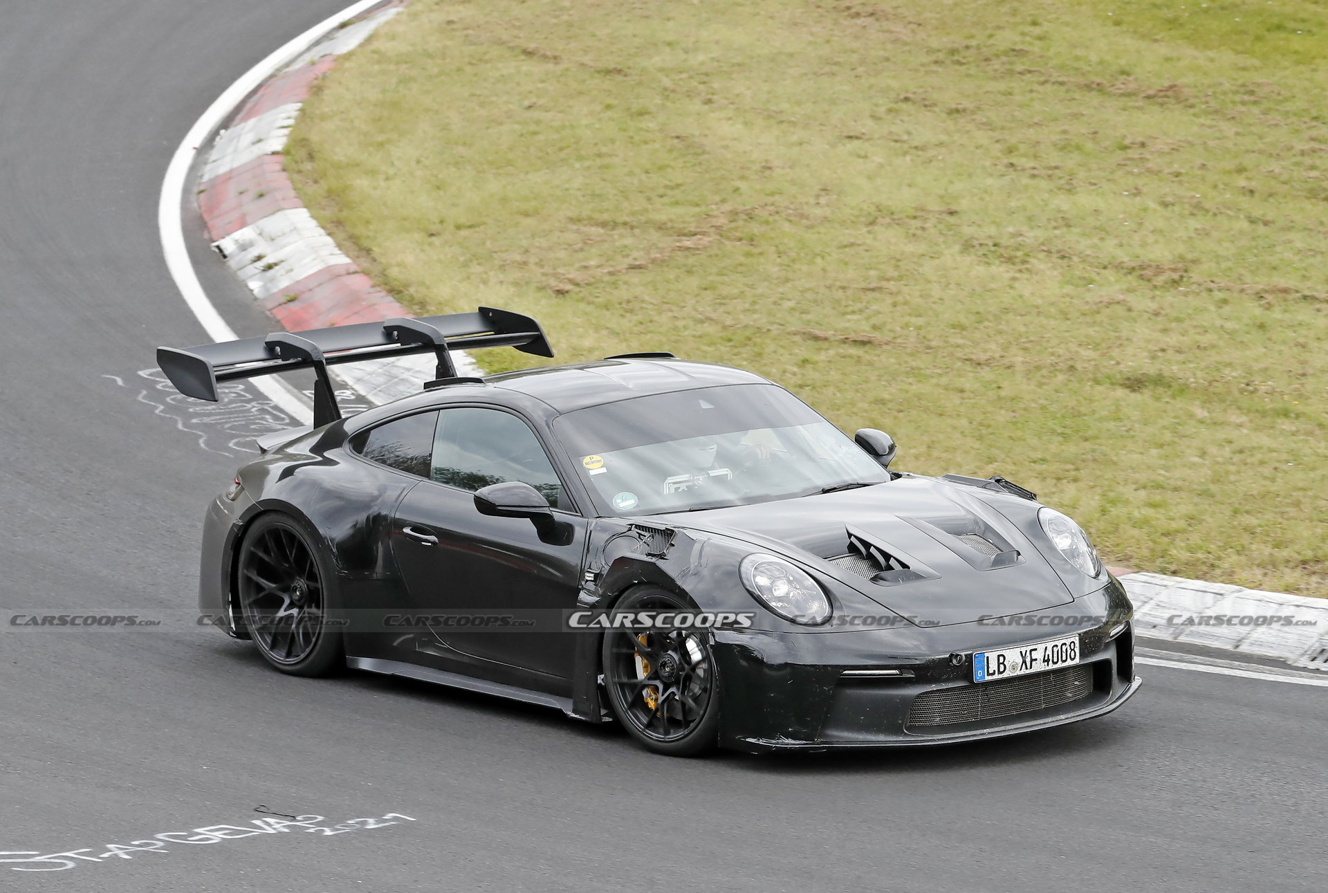 2023 Porsche 911 GT3 RS Spied Again With Racecar Looks And Conventional Door Handles