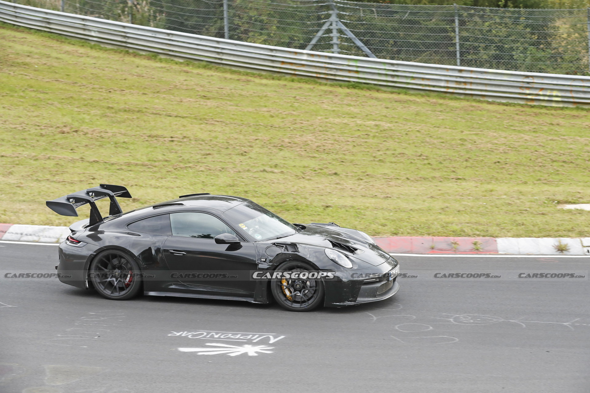 2023 Porsche 911 GT3 RS Spied Again With Racecar Looks And Conventional Door Handles