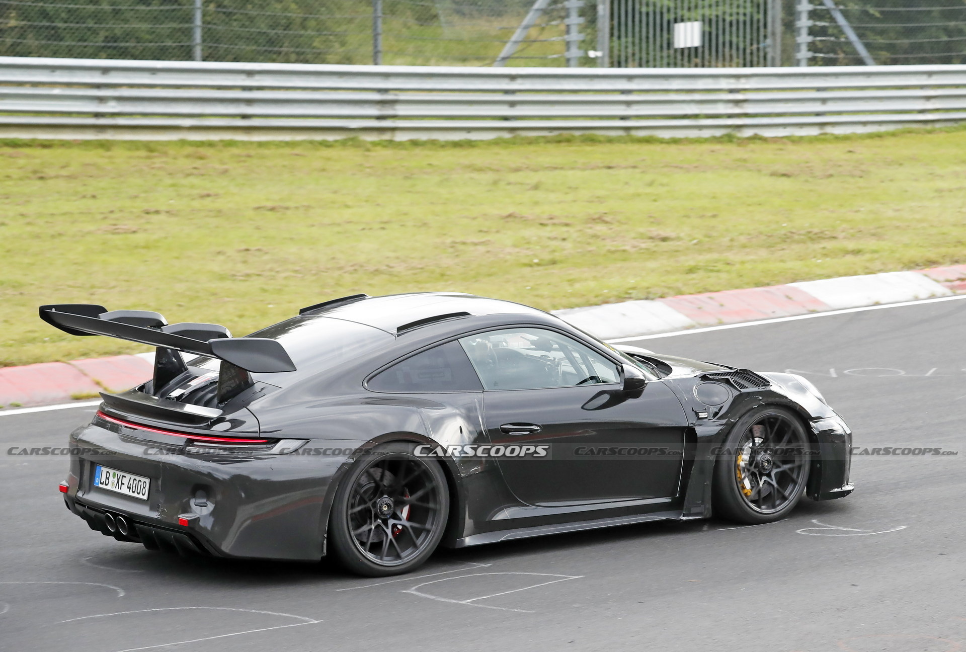 2023 Porsche 911 GT3 RS Spied Again With Racecar Looks And Conventional Door Handles