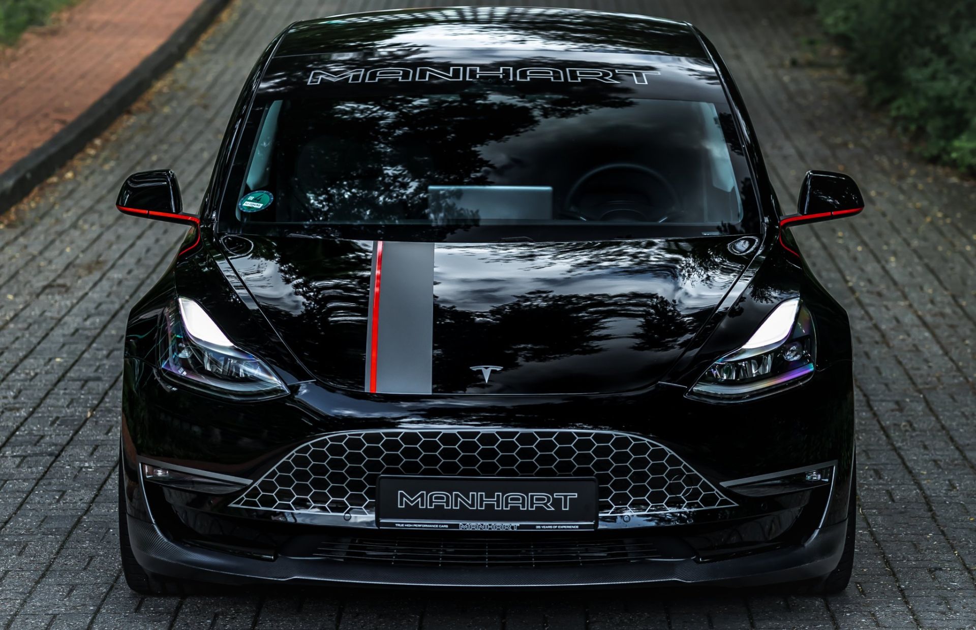 Manhart Is Offering A Tuned Tesla Model 3 Performance With 543 HP And A  Grille Decal For $90k