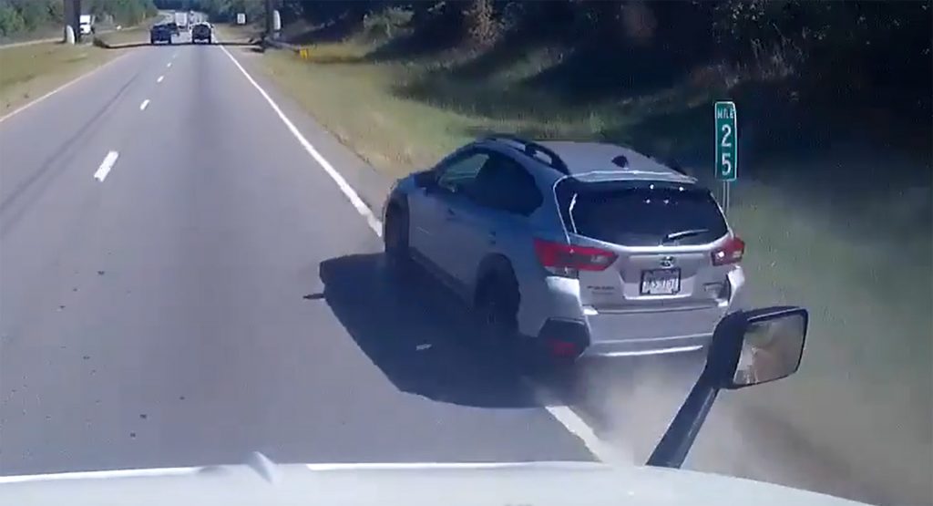  Subaru Driver Attempts To Pass Semi Truck With Two Wheels On The Grass, Barely Makes It Through