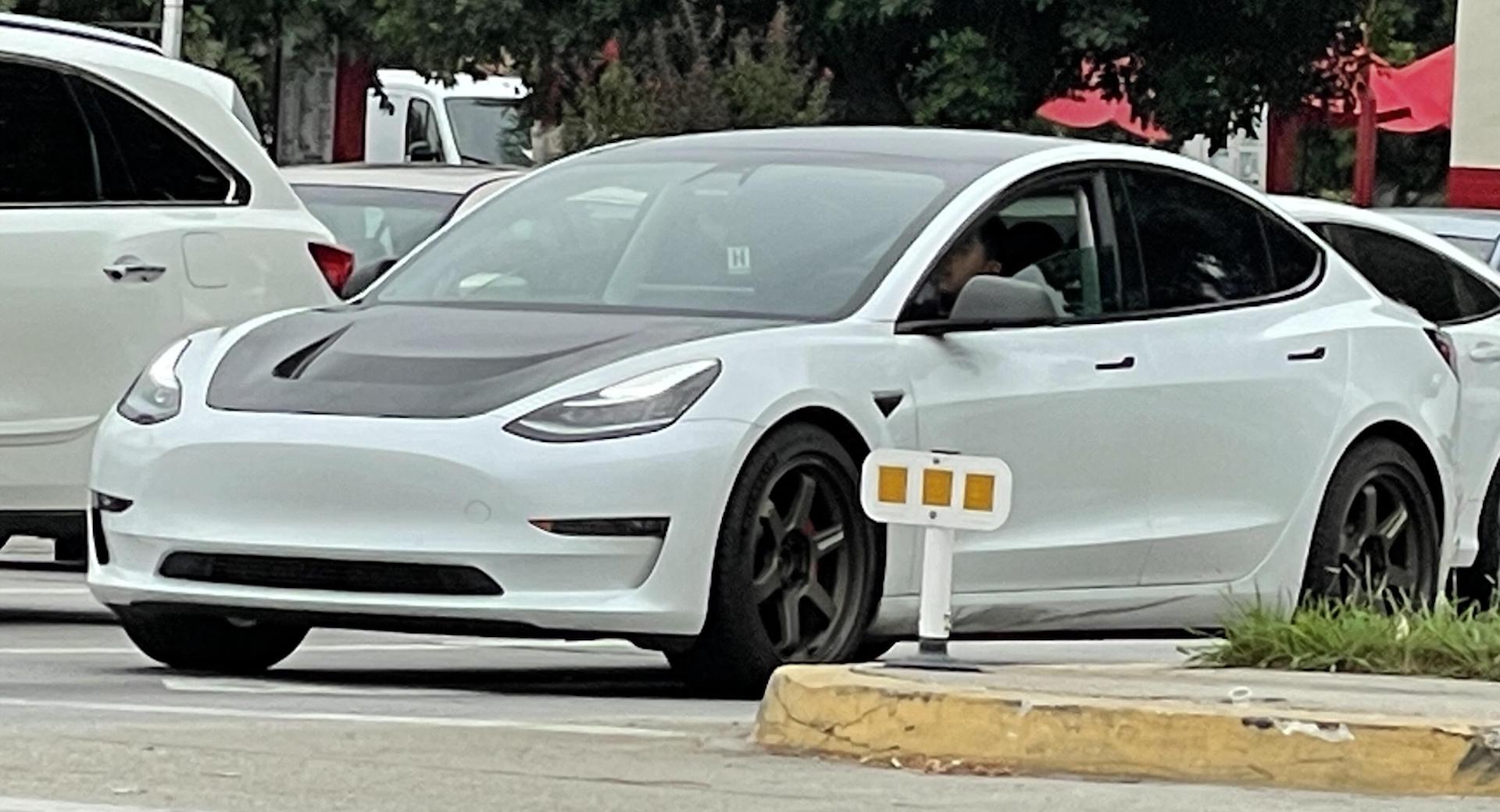 Do You Rate Or Hate This Modded Tesla’s Vented Carbon Hood?