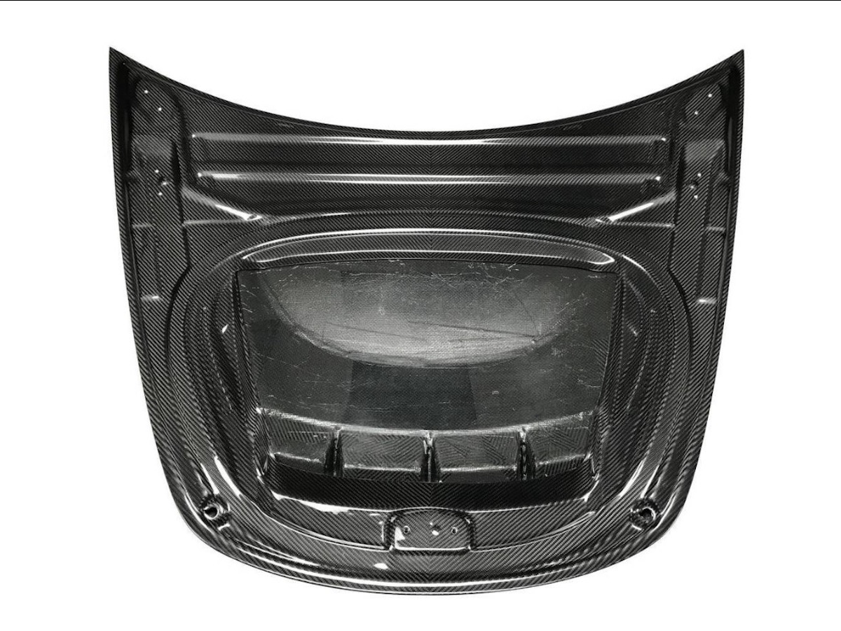 Do You Rate Or Hate This Modded Tesla’s Vented Carbon Hood?