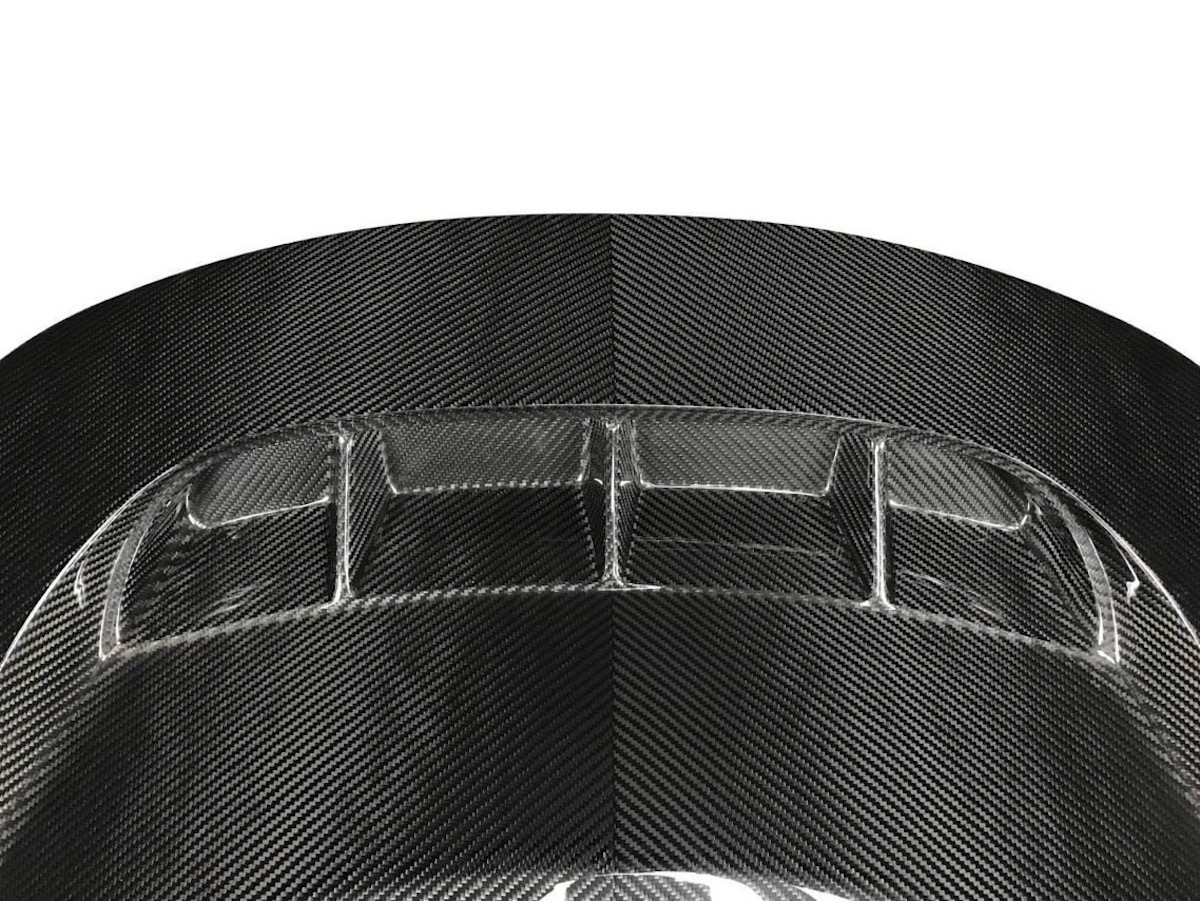 Do You Rate Or Hate This Modded Tesla’s Vented Carbon Hood?