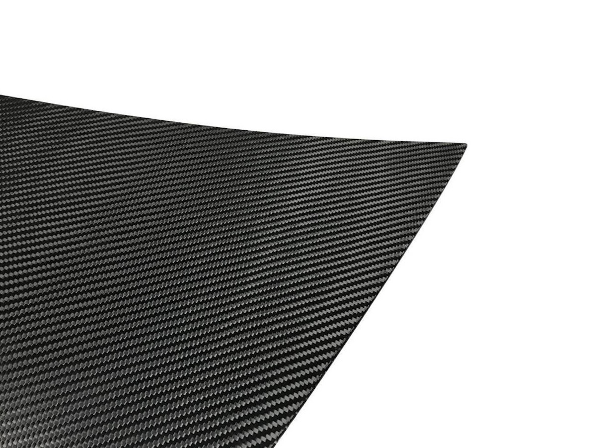 Do You Rate Or Hate This Modded Tesla’s Vented Carbon Hood?