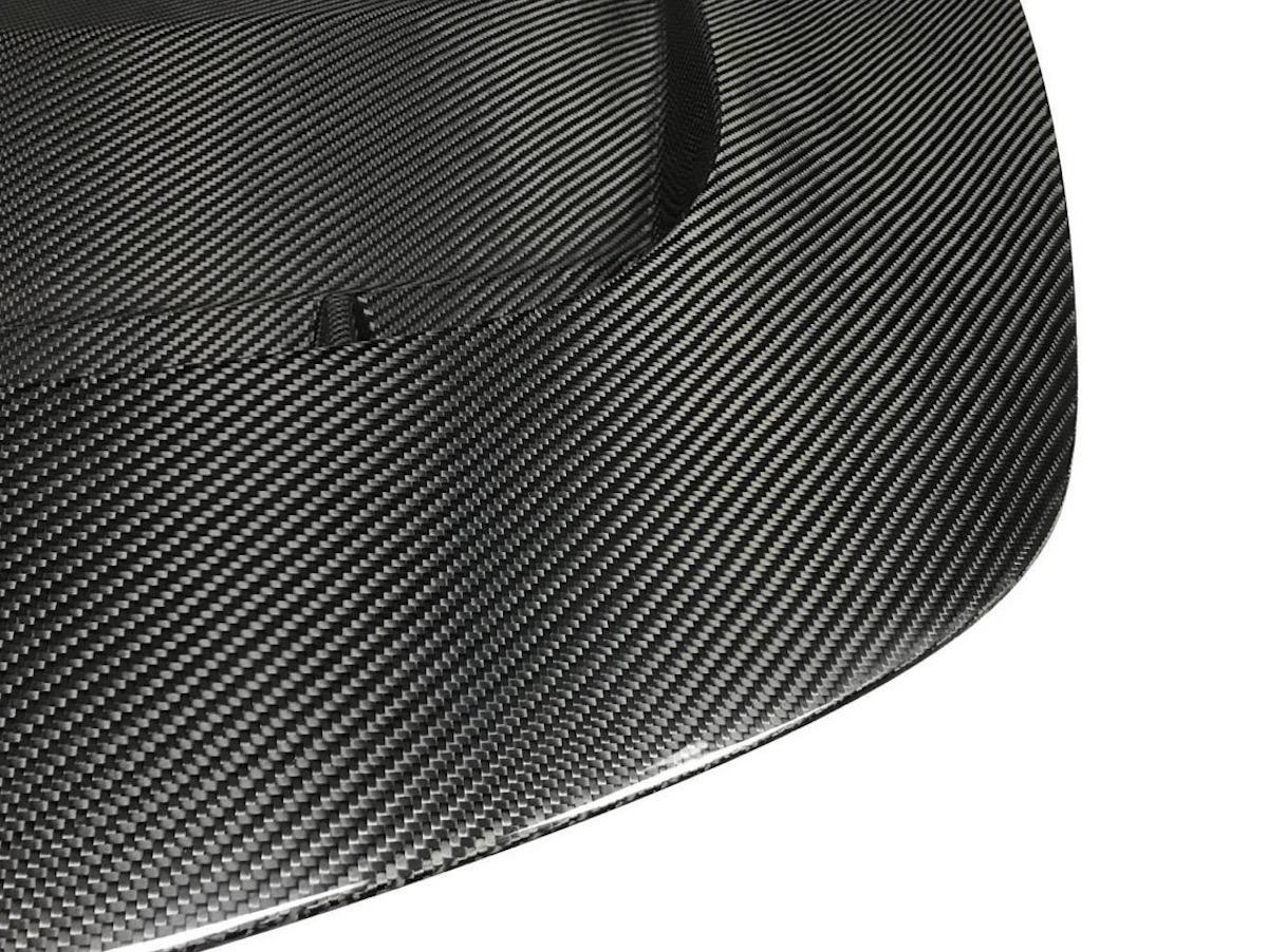 Do You Rate Or Hate This Modded Tesla’s Vented Carbon Hood?