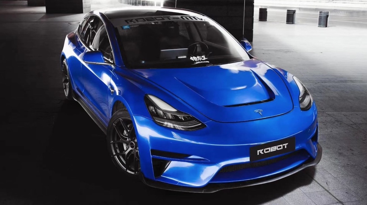 Do You Rate Or Hate This Modded Tesla’s Vented Carbon Hood?