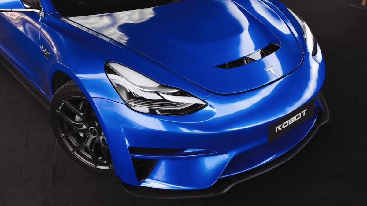 Do You Rate Or Hate This Modded Tesla’s Vented Carbon Hood?