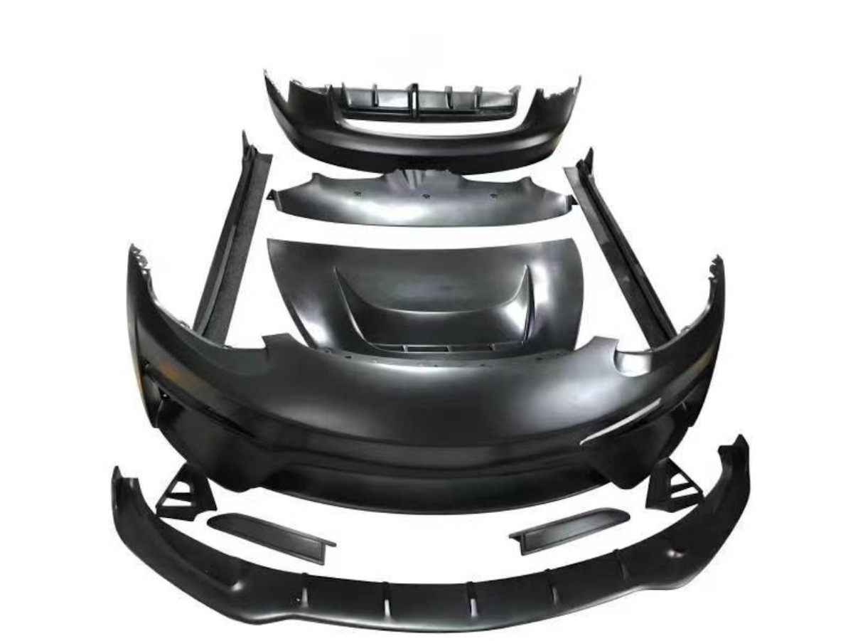 Do You Rate Or Hate This Modded Tesla’s Vented Carbon Hood?