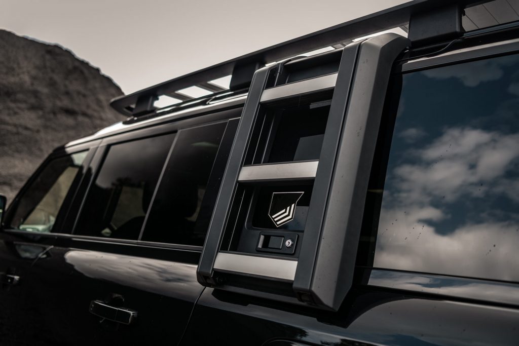 Heritage Customs Dresses The Land Rover Defender In All-Black Tuxedo ...