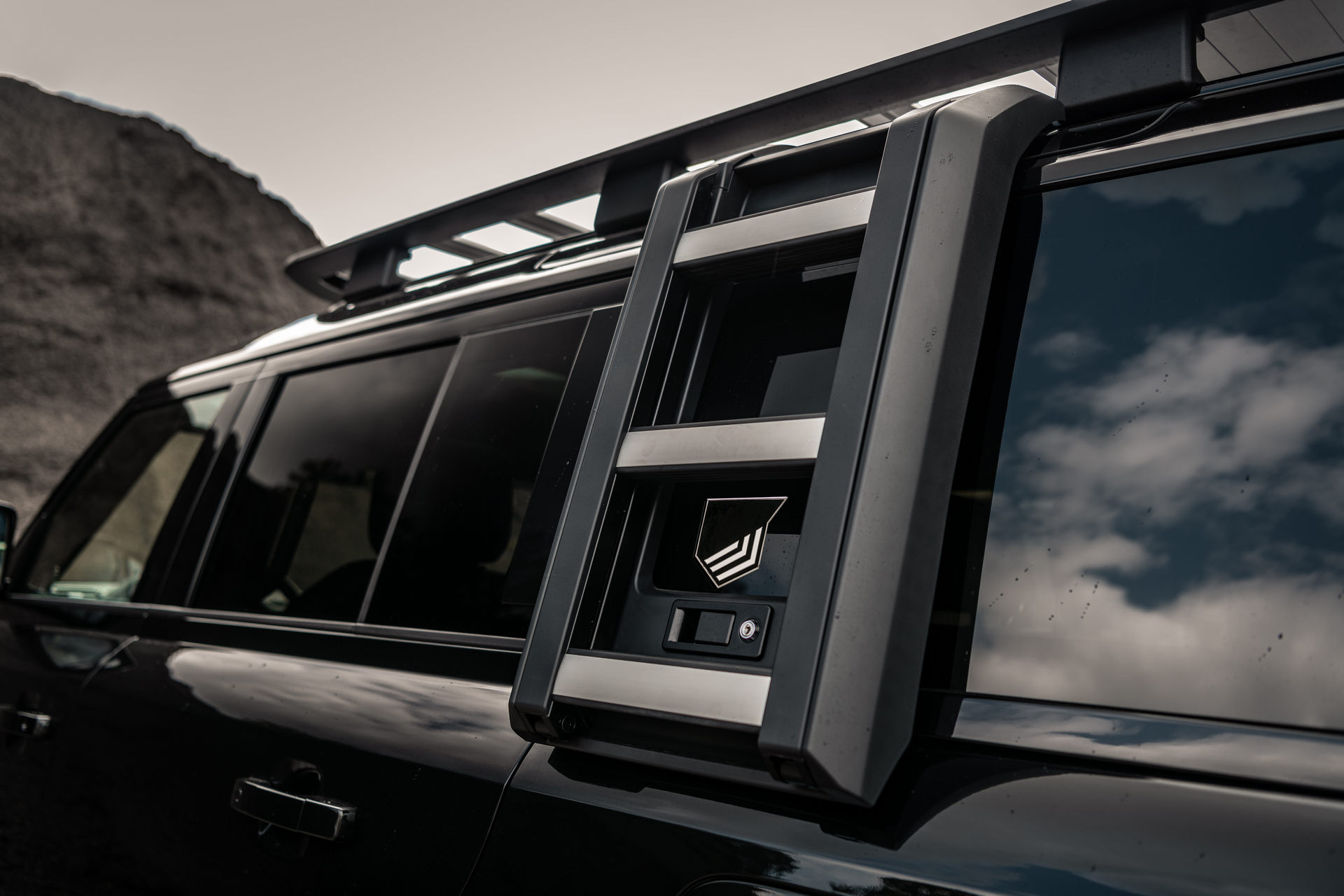 Heritage Customs Dresses The Land Rover Defender In All-Black Tuxedo