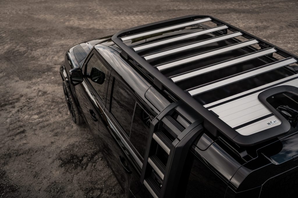 Heritage Customs Dresses The Land Rover Defender In All-Black Tuxedo ...