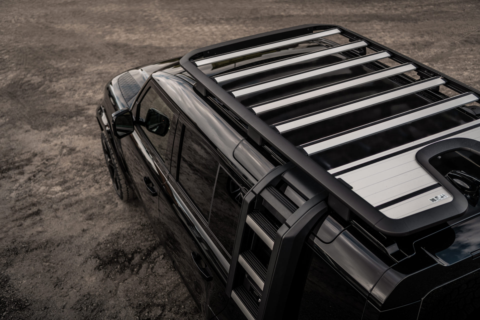 Heritage Customs Dresses The Land Rover Defender In All-Black Tuxedo