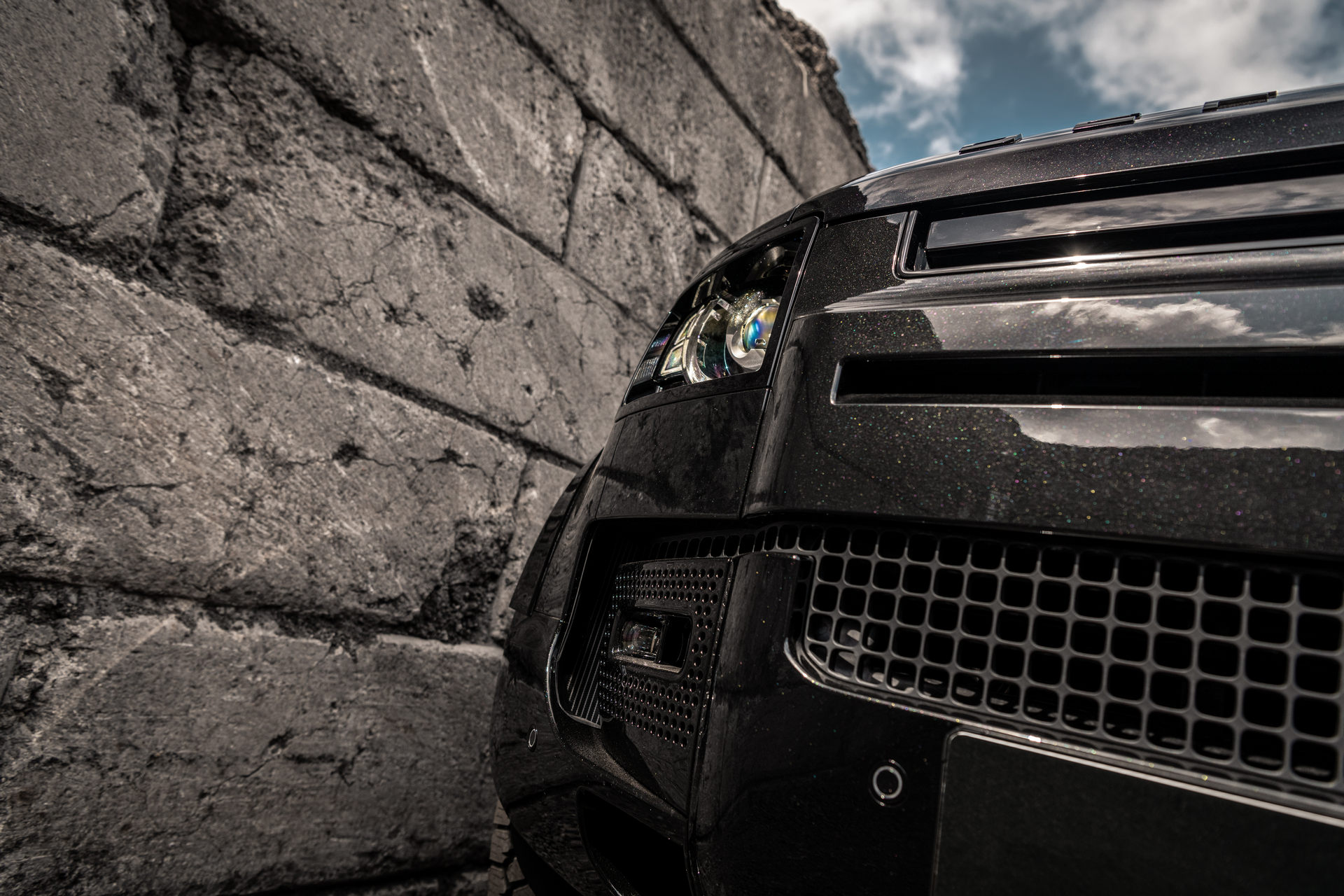 Heritage Customs Dresses The Land Rover Defender In All-Black Tuxedo