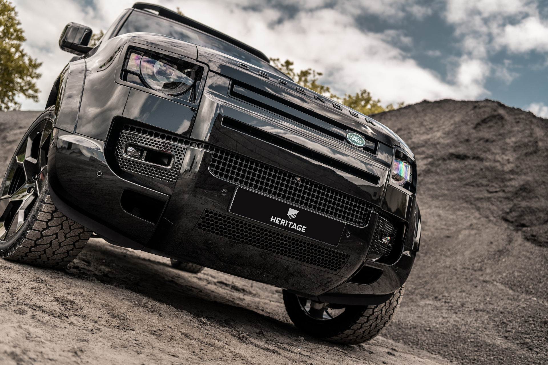 Heritage Customs Dresses The Land Rover Defender In All-Black Tuxedo