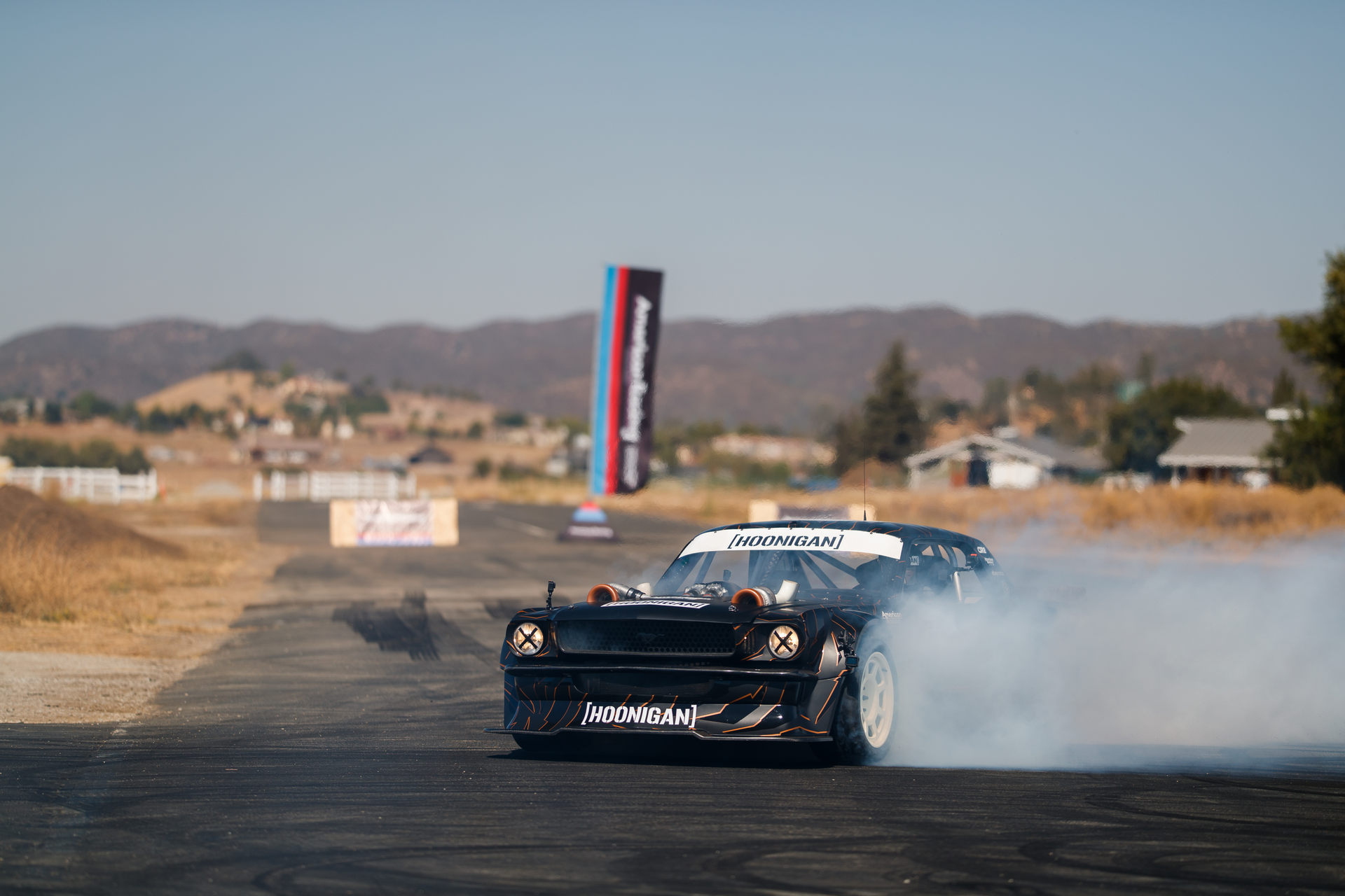 Ken Block’s 14-Year-Old Daughter Races The Hoonicorn Against A 4,000 HP NHRA Corvette