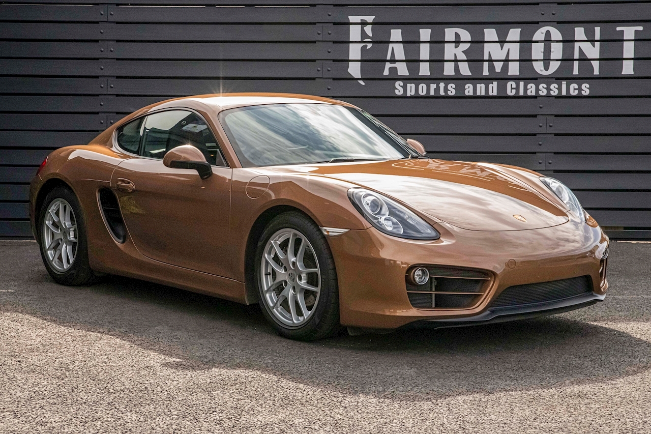 Does This Cognac Metallic Porsche Cayman Do It For You?