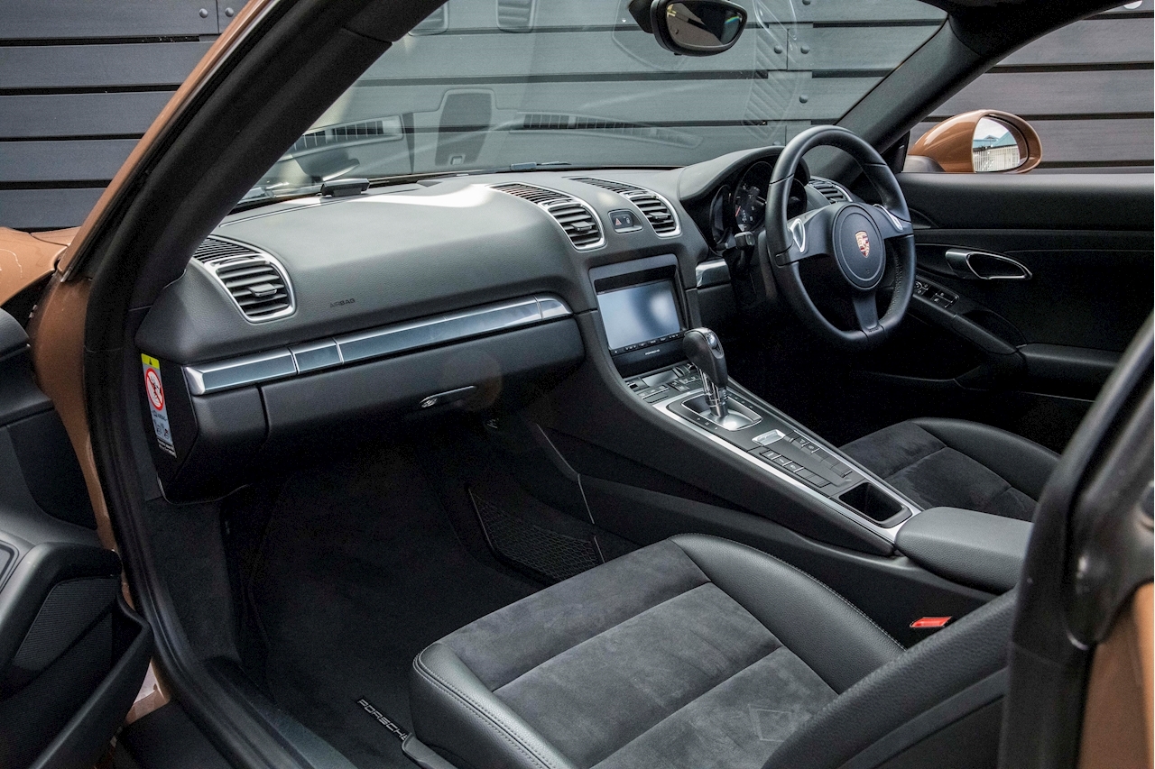 Does This Cognac Metallic Porsche Cayman Do It For You?