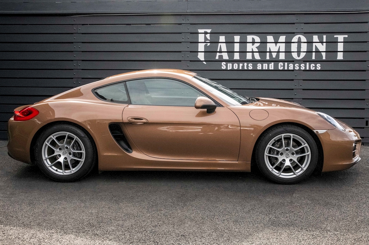 Does This Cognac Metallic Porsche Cayman Do It For You?