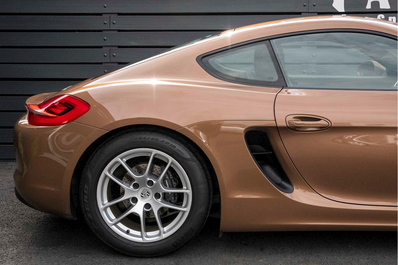 Does This Cognac Metallic Porsche Cayman Do It For You?