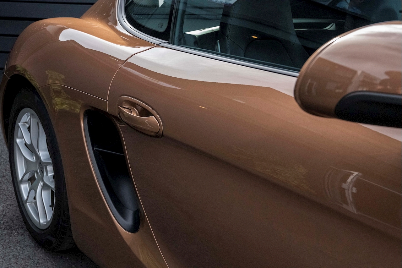Does This Cognac Metallic Porsche Cayman Do It For You?