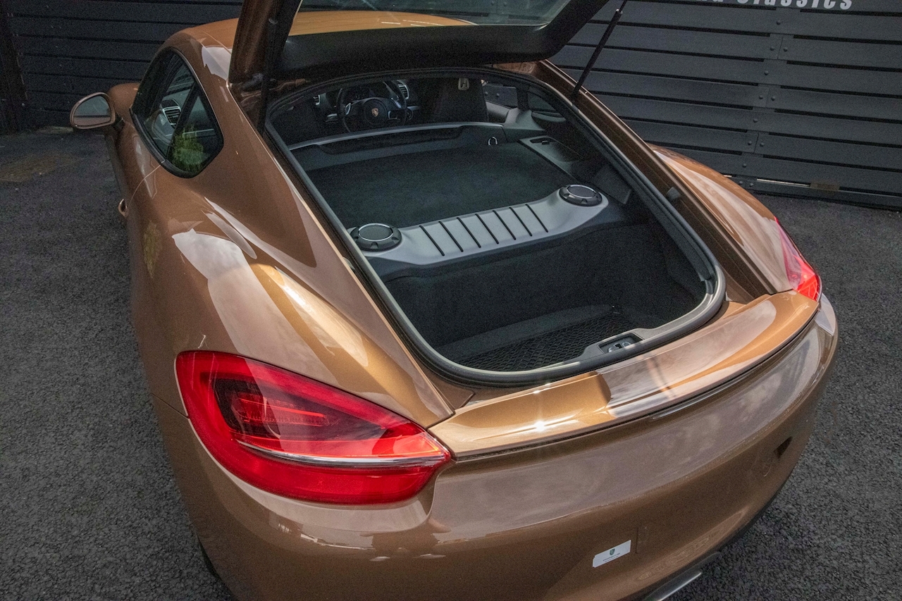 Does This Cognac Metallic Porsche Cayman Do It For You?