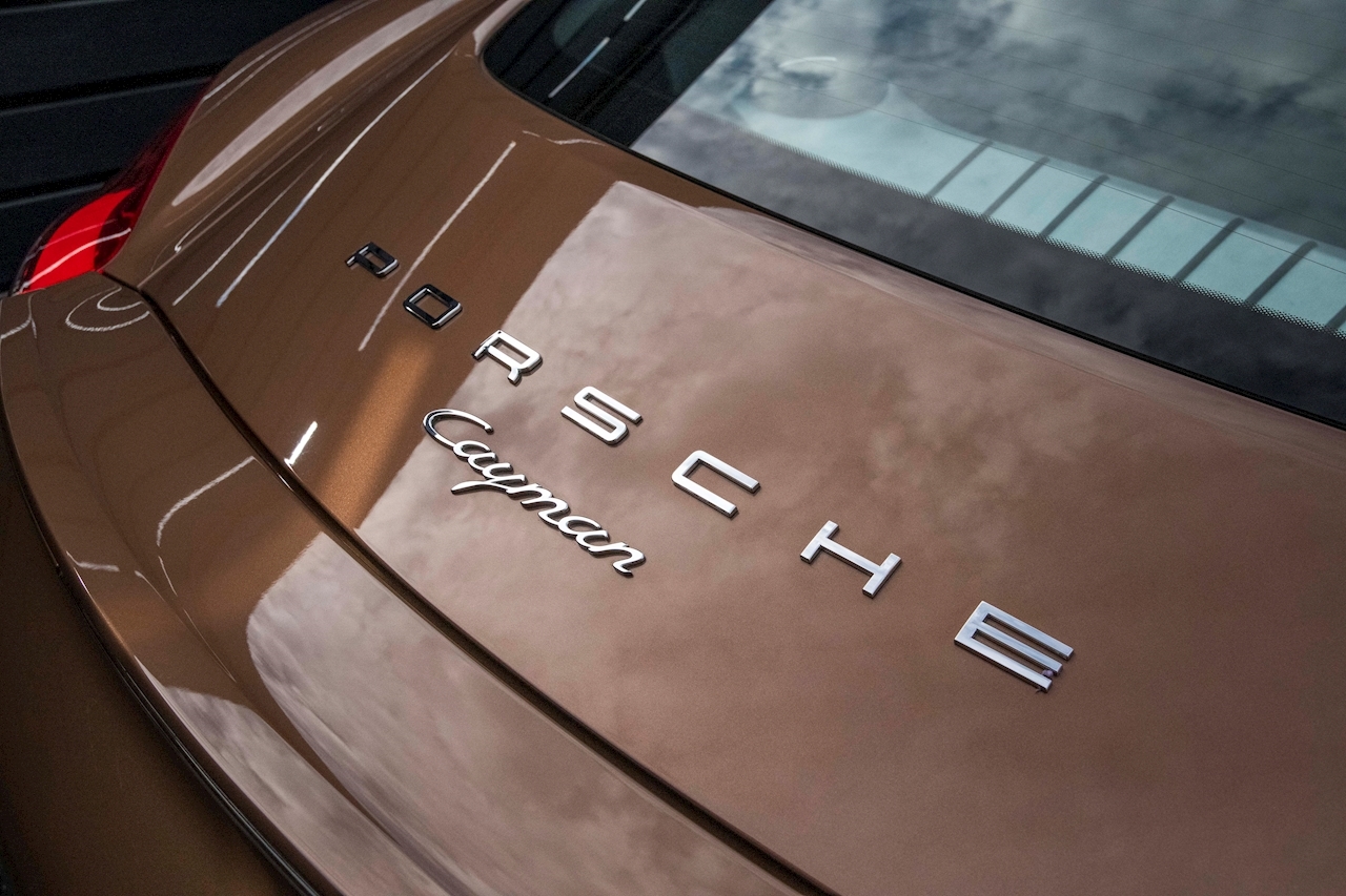 Does This Cognac Metallic Porsche Cayman Do It For You?