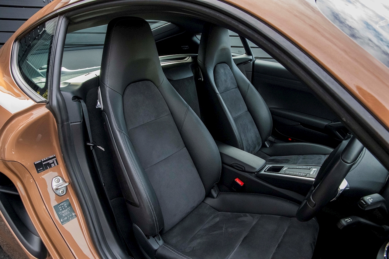 Does This Cognac Metallic Porsche Cayman Do It For You?