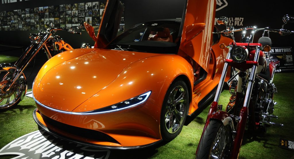  Songsan Motors SS GT Electric Four-Door Coupe Has Lamborghini-Like Front Scissor Doors