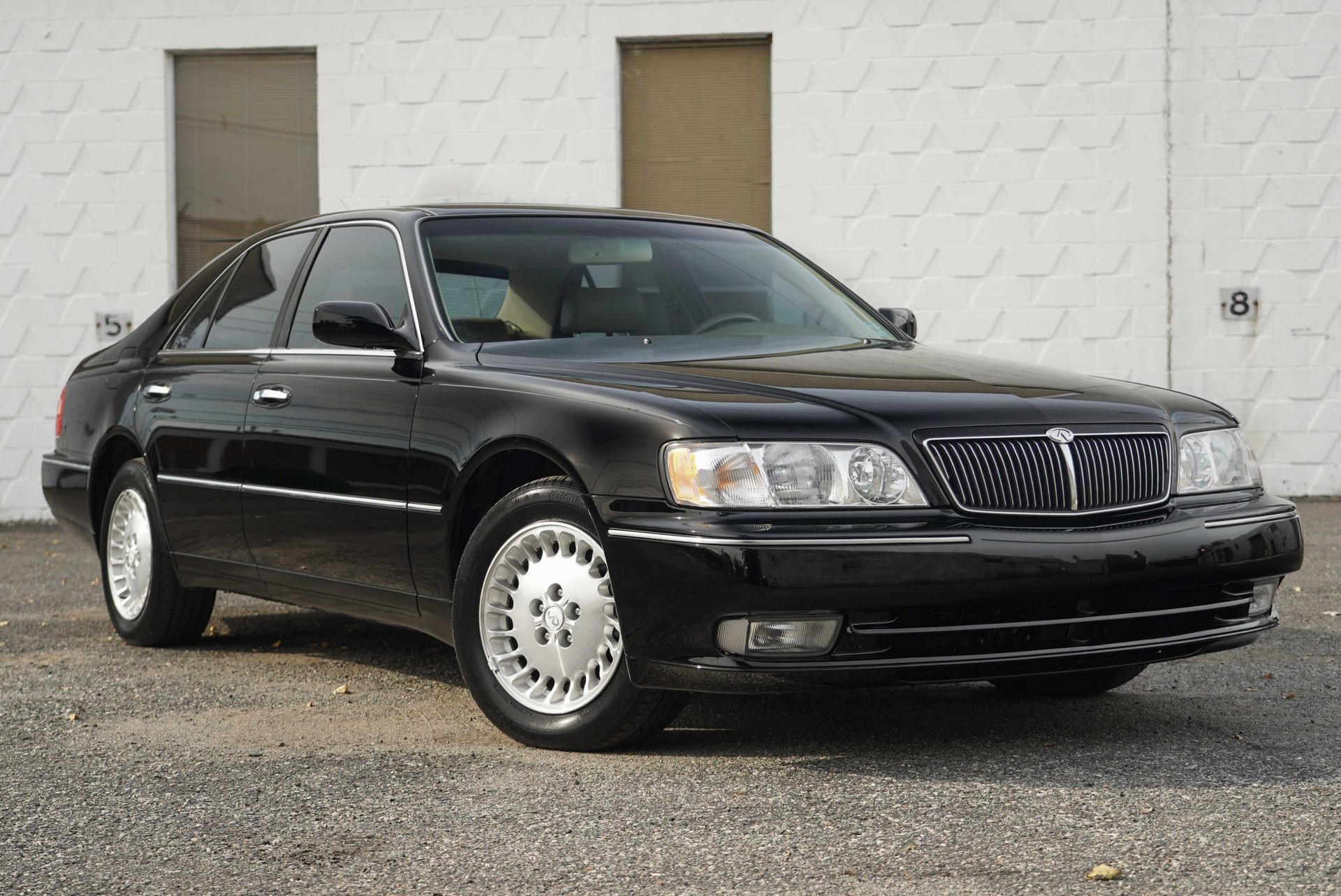 This 17k Mile Infiniti Q45 From 2000 Comes Complete With A Motorola Flip Phone