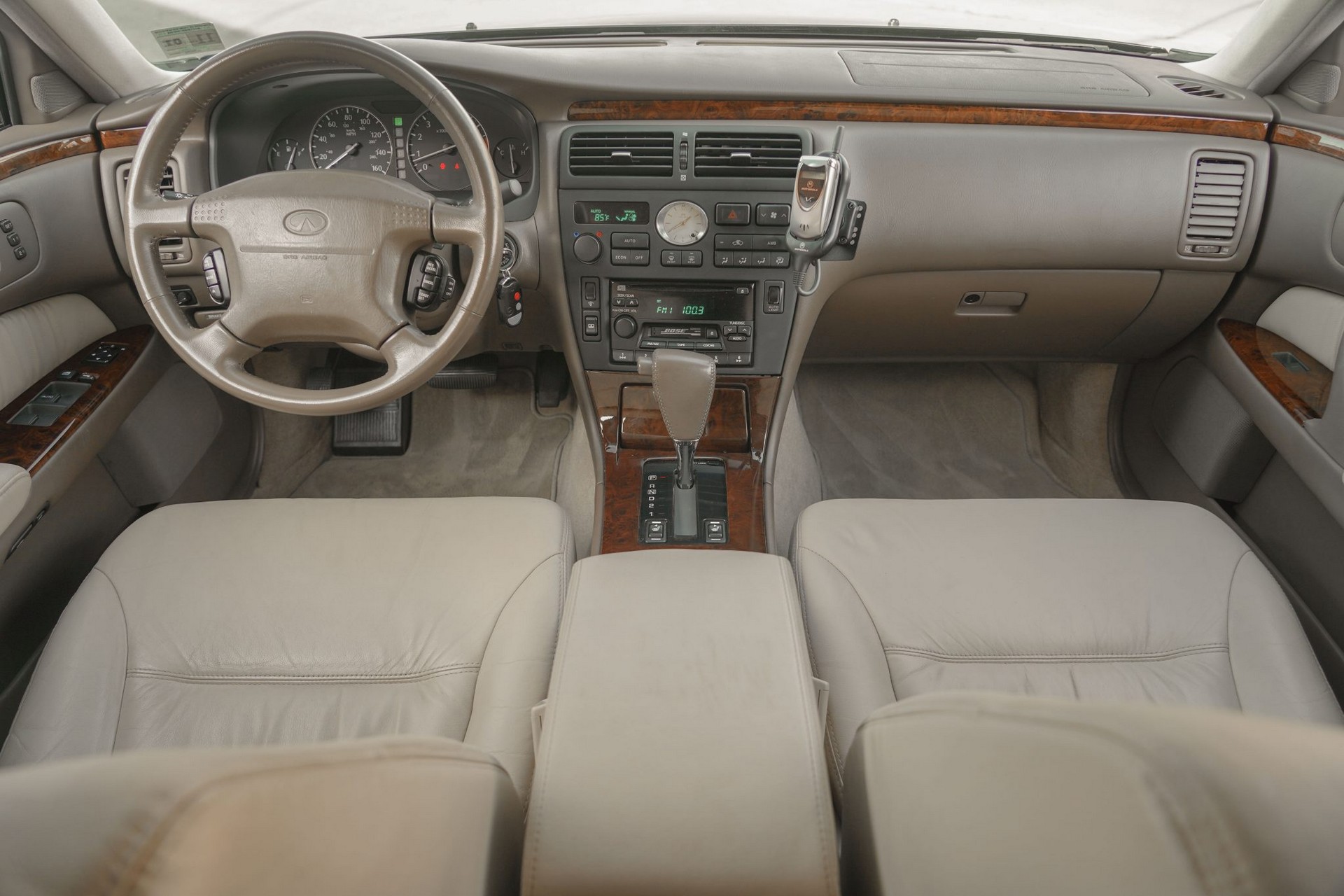 This 17k Mile Infiniti Q45 From 2000 Comes Complete With A Motorola Flip Phone