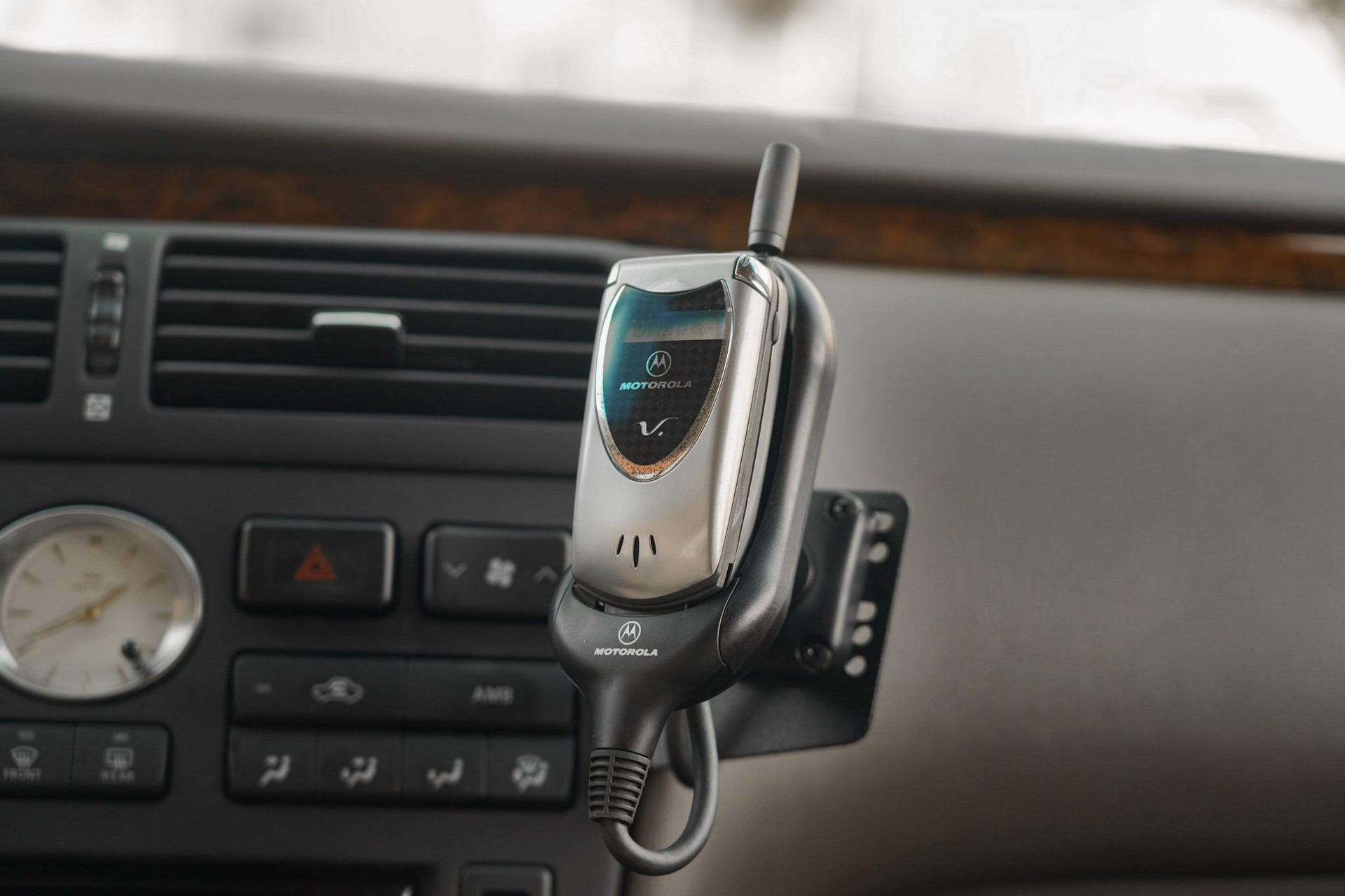 This 17k Mile Infiniti Q45 From 2000 Comes Complete With A Motorola Flip Phone