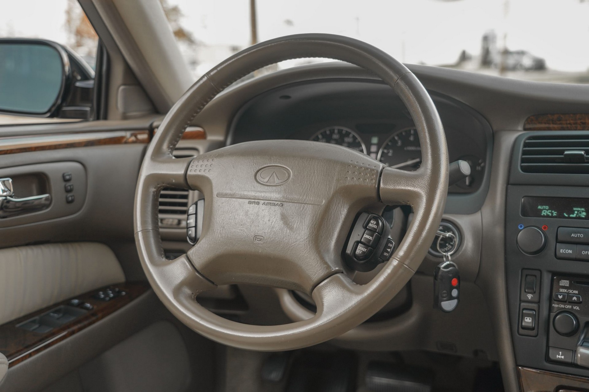 This 17k Mile Infiniti Q45 From 2000 Comes Complete With A Motorola Flip Phone