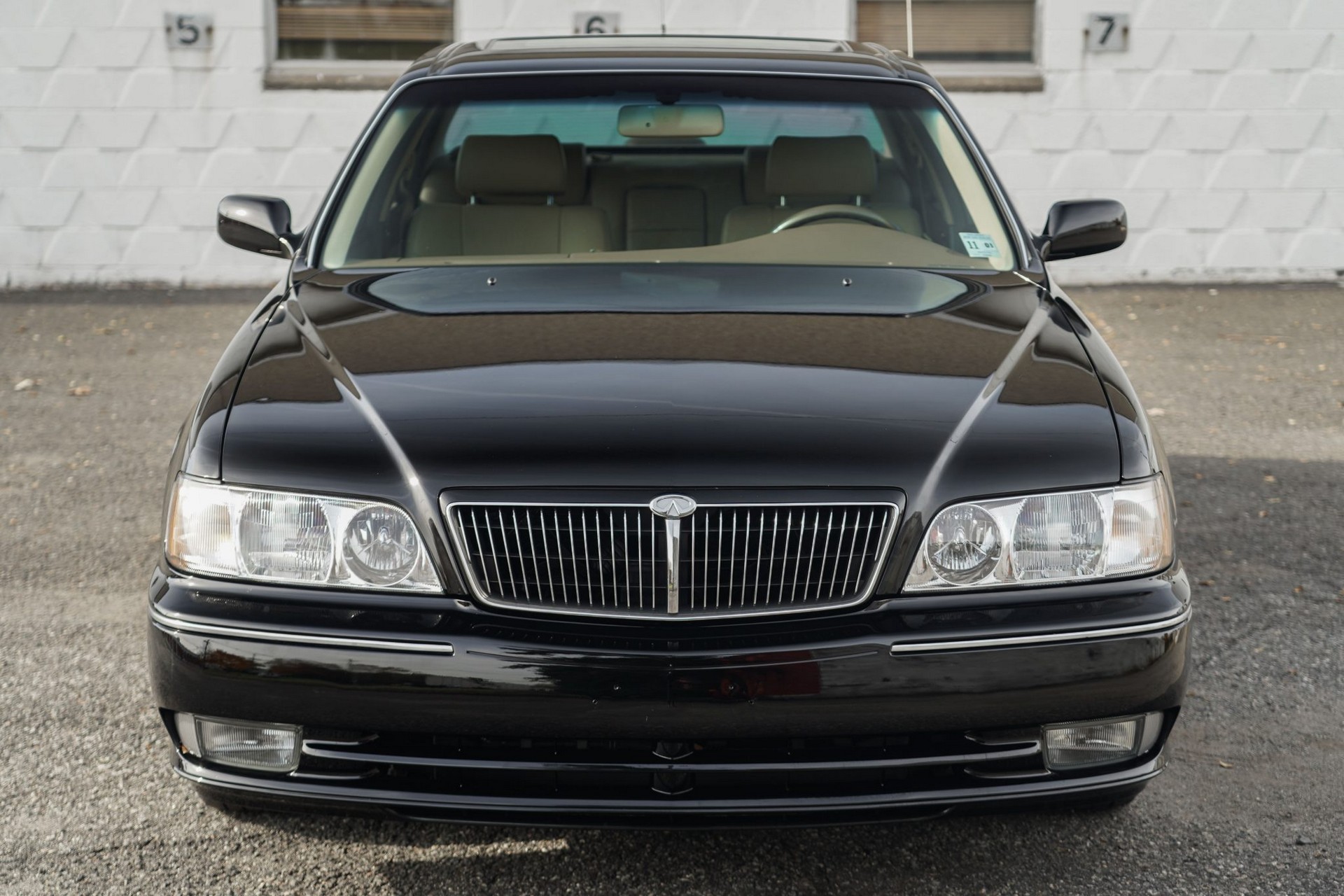 This 17k Mile Infiniti Q45 From 2000 Comes Complete With A Motorola Flip Phone