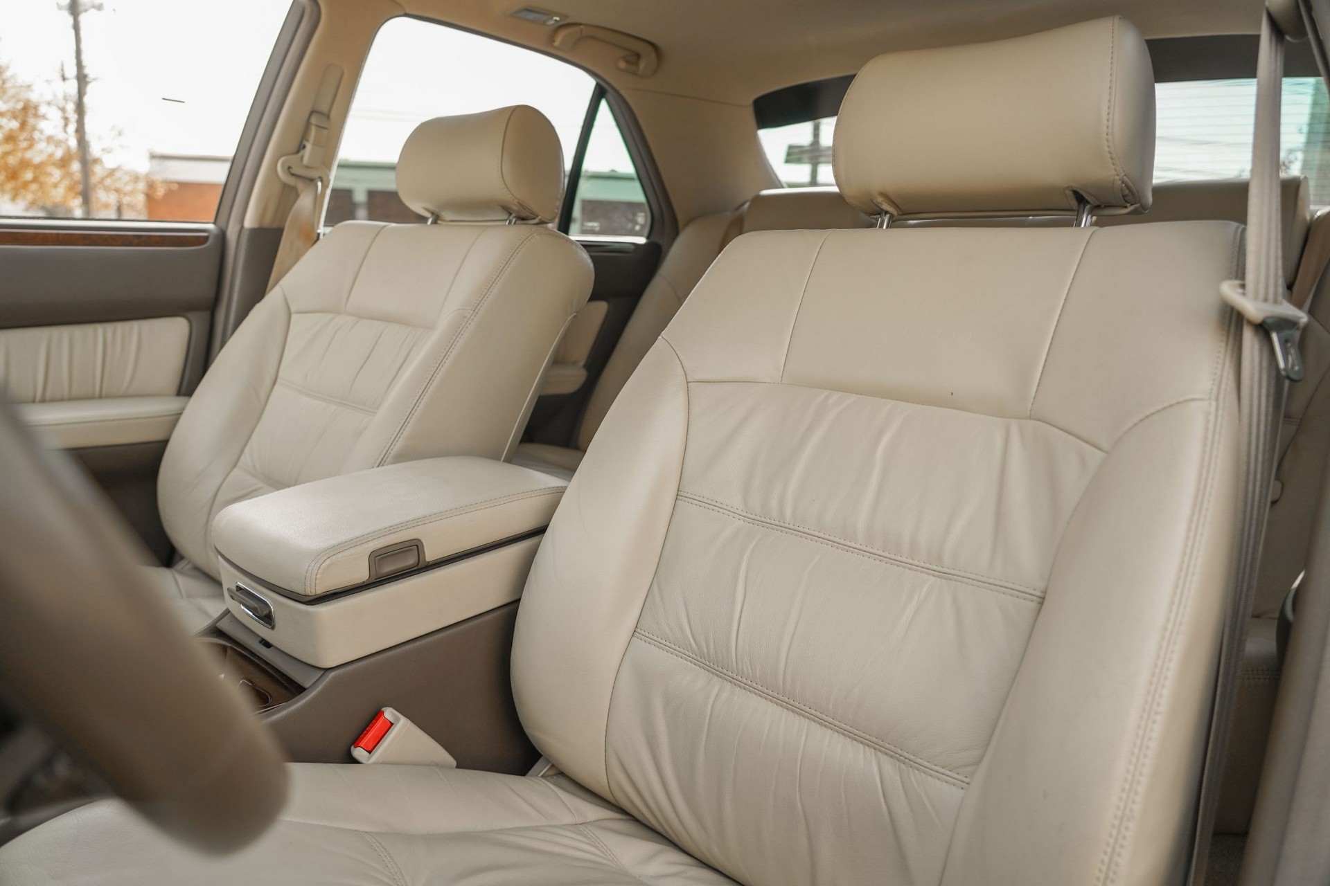 This 17k Mile Infiniti Q45 From 2000 Comes Complete With A Motorola Flip Phone