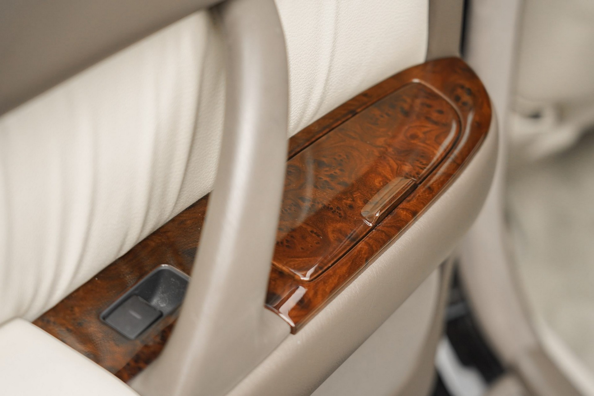 This 17k Mile Infiniti Q45 From 2000 Comes Complete With A Motorola Flip Phone