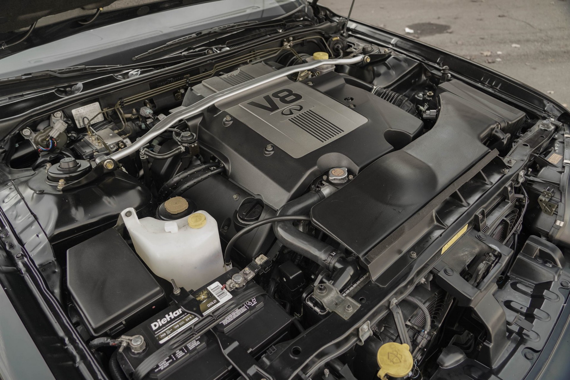 This 17k Mile Infiniti Q45 From 2000 Comes Complete With A Motorola Flip Phone